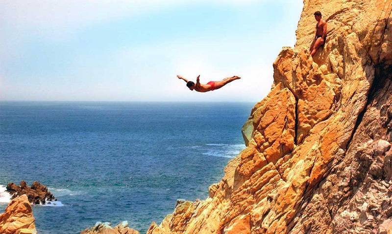 Cliff Divers Put on a Risky Show for Tourists in Acapulco