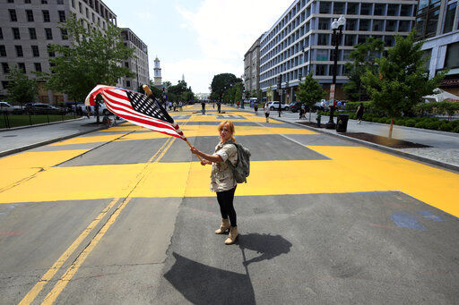 BLM protester with American flag