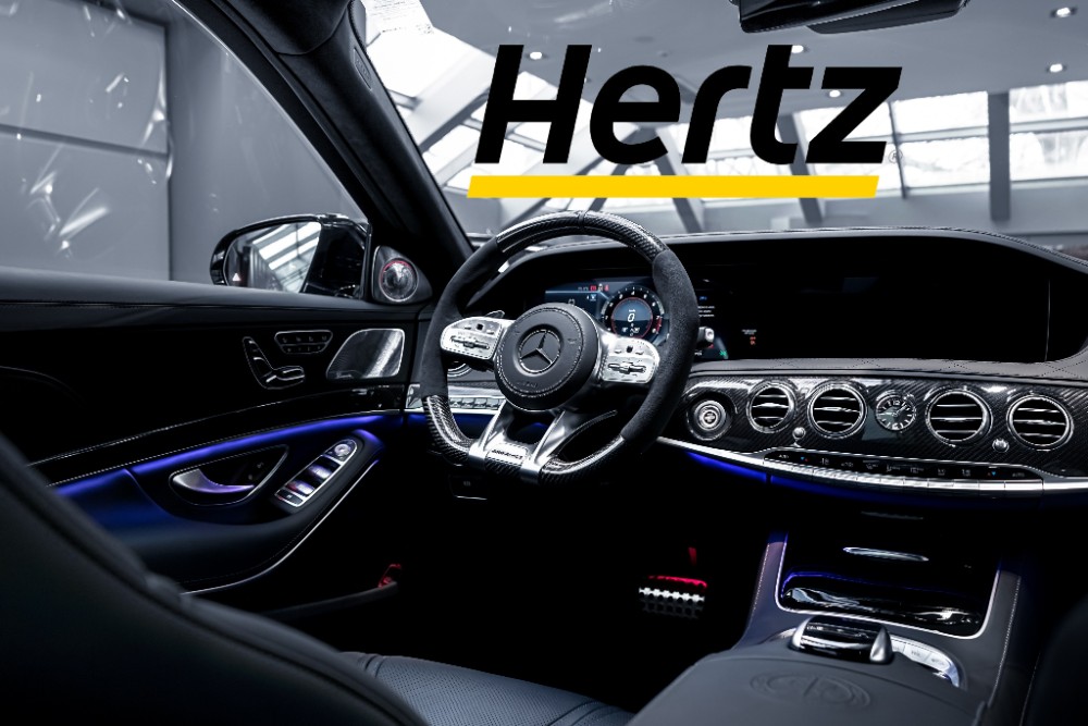 Hertz logo inside a car