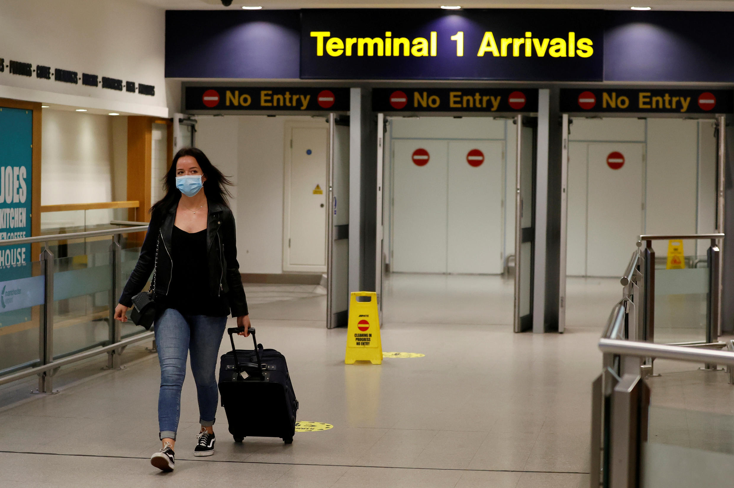 female passenger leaving a terminal