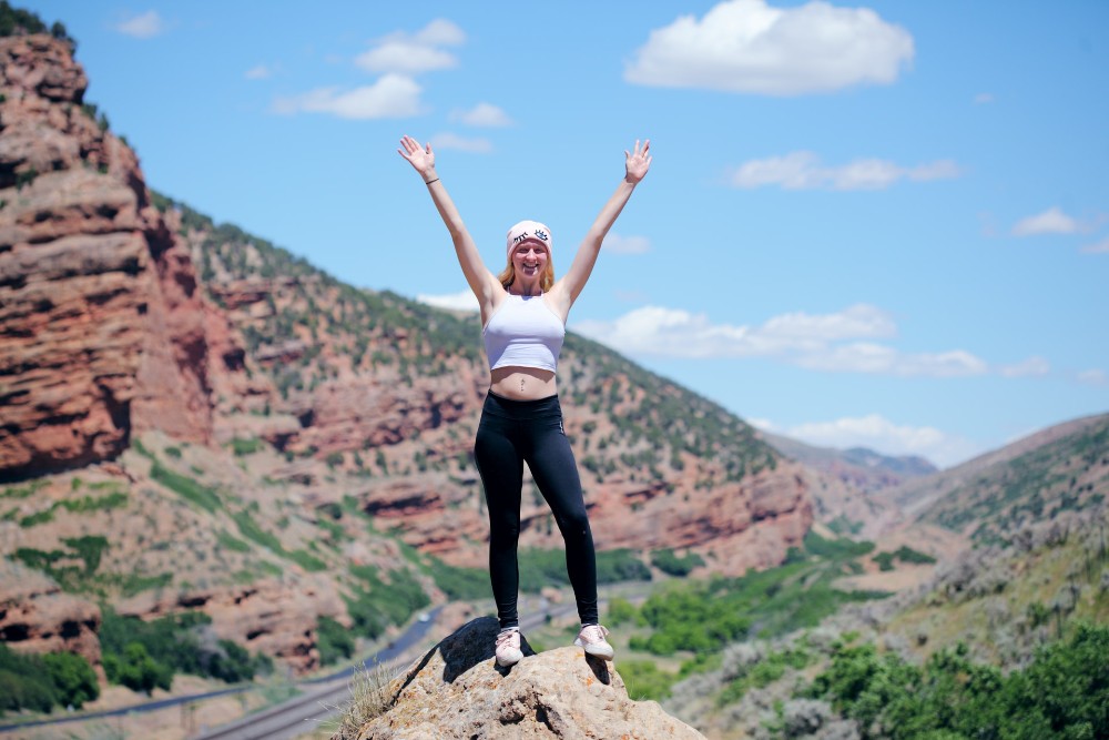 woman on top of a hill