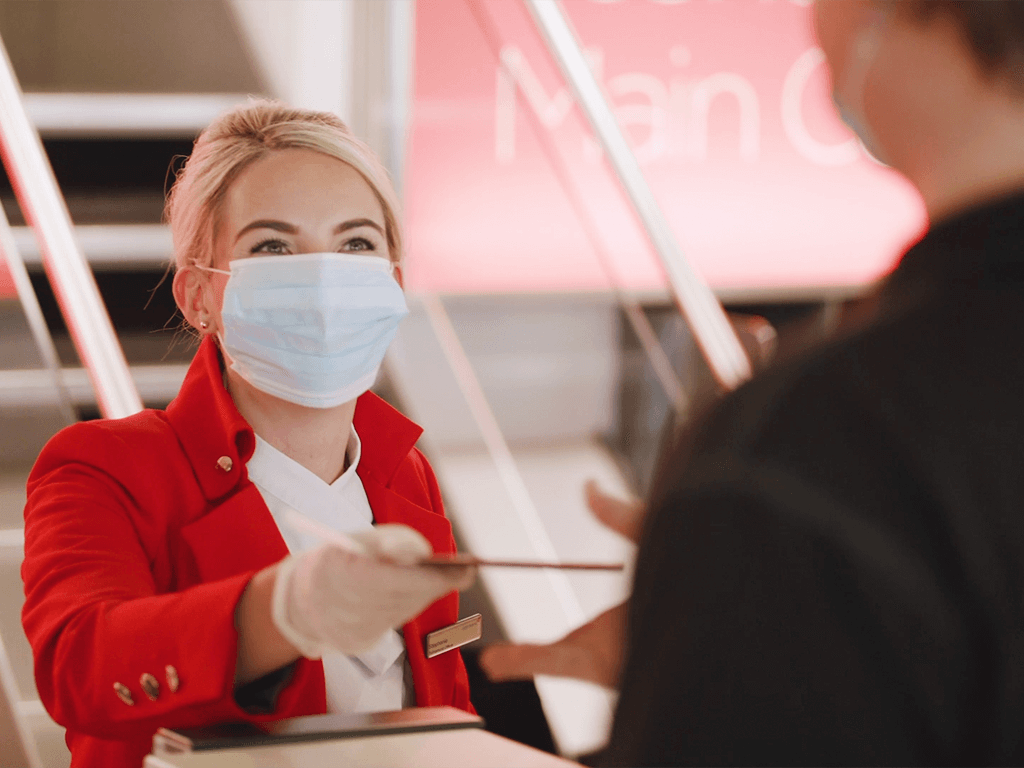 Virgin Atlantic flight attendant with mask