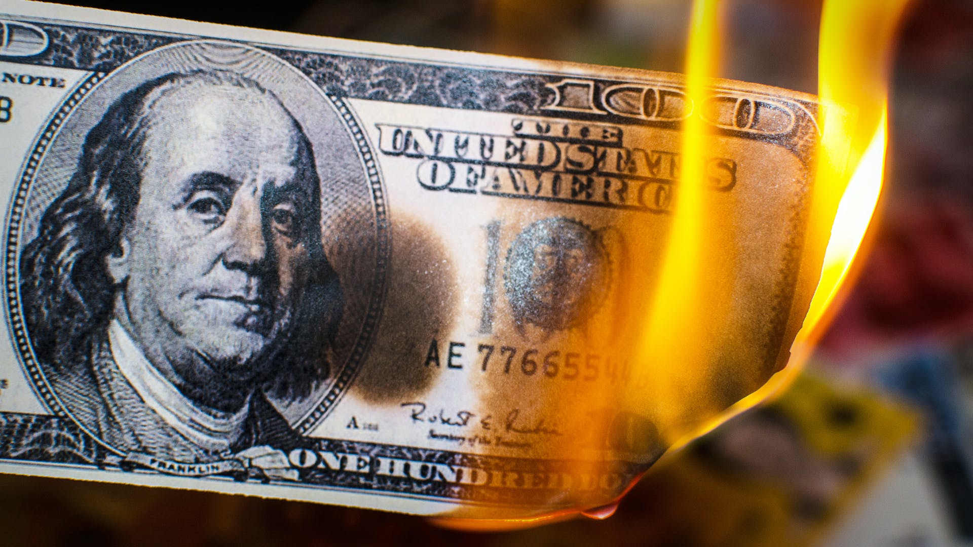 dollar in flames