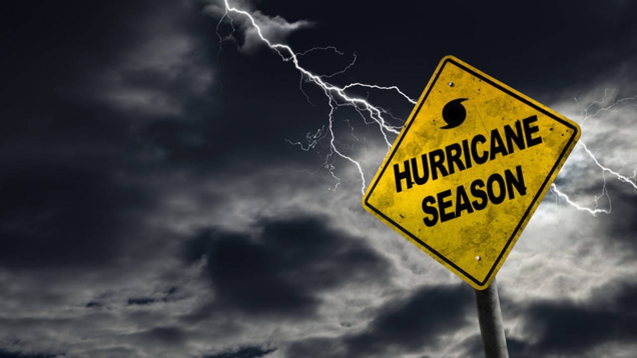 hurricane season sign and bolt of lightning
