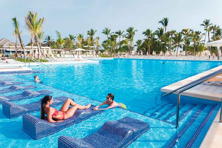 hotel swimming pool with couple