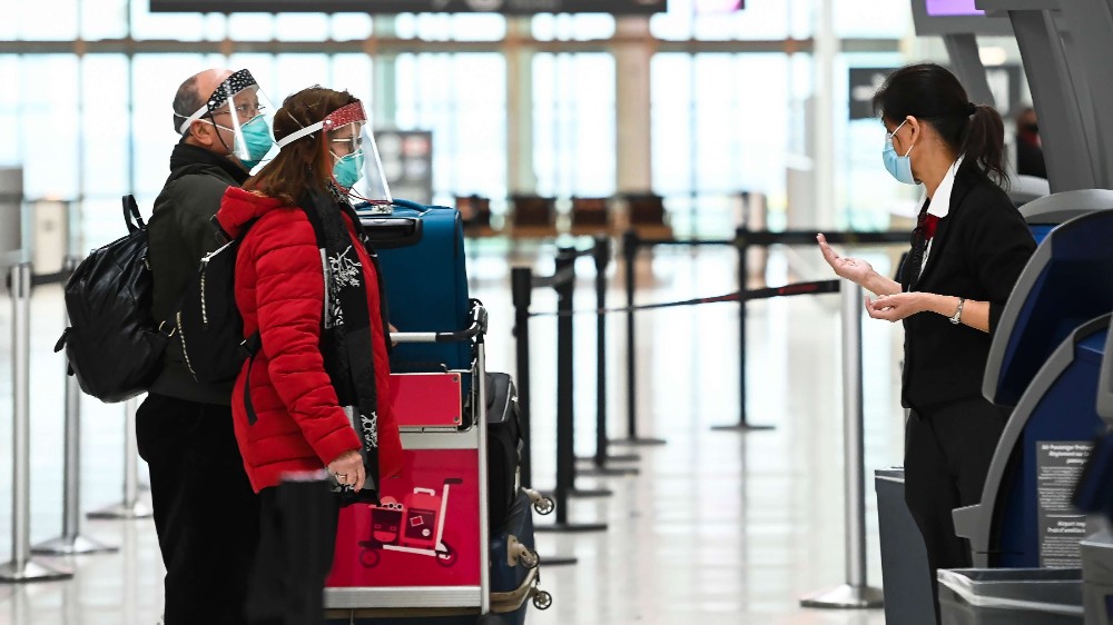 Canadian travelers at airport