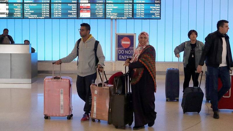 Two Judges Put President Trump’s New Travel Ban on Hold