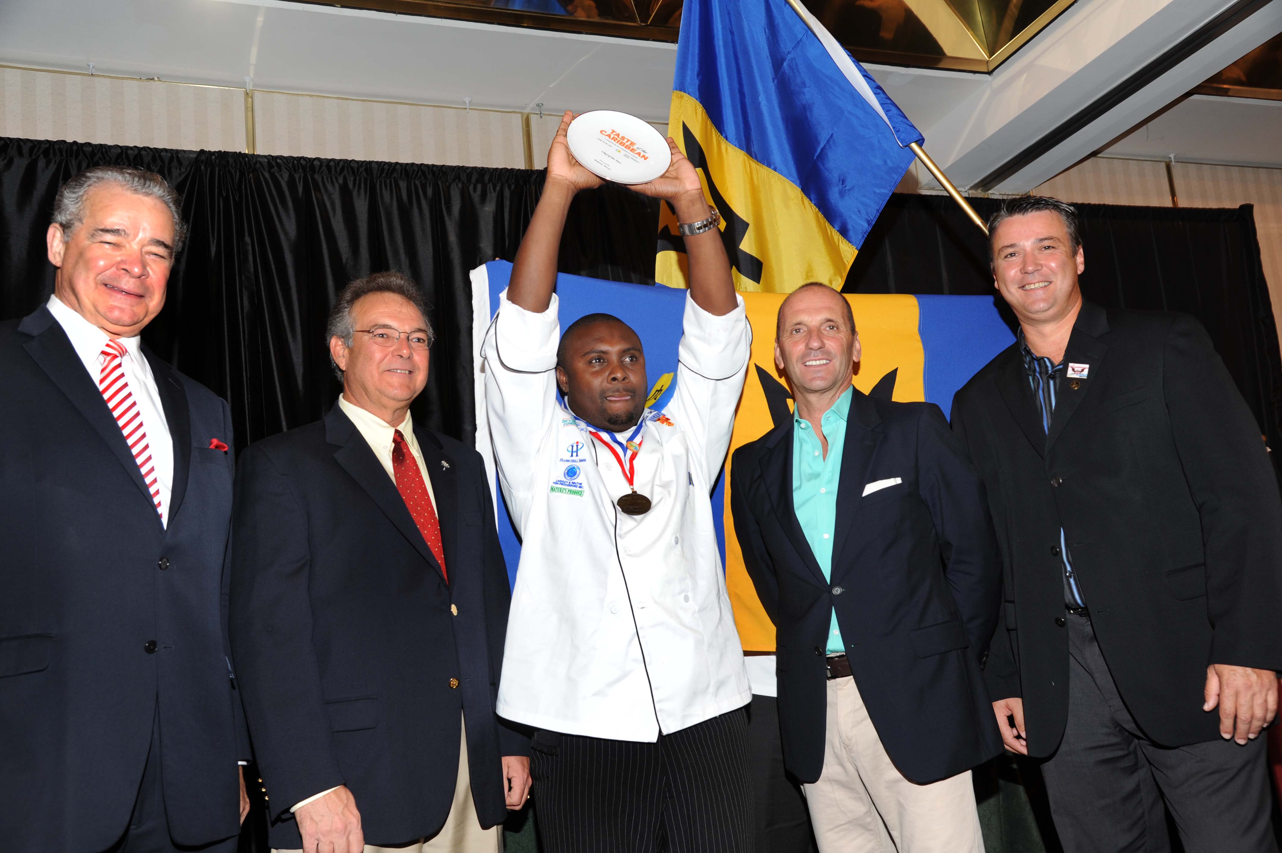 Caribbean Chef of the Year Mitchell Husbands (center) pictured with (l-r) Alec Sanguinetti, director general & CEO of CHTA; Rick Crossland, Ruth’s Hospitality Group, Josef Forstmayr, president of CHTA; and Peter Olsacher, Bahama Breeze. Trinidad & Tobago, Barbados, Curacao, USVI, & BVI Take Top Honors at Taste of the Caribbean 2011